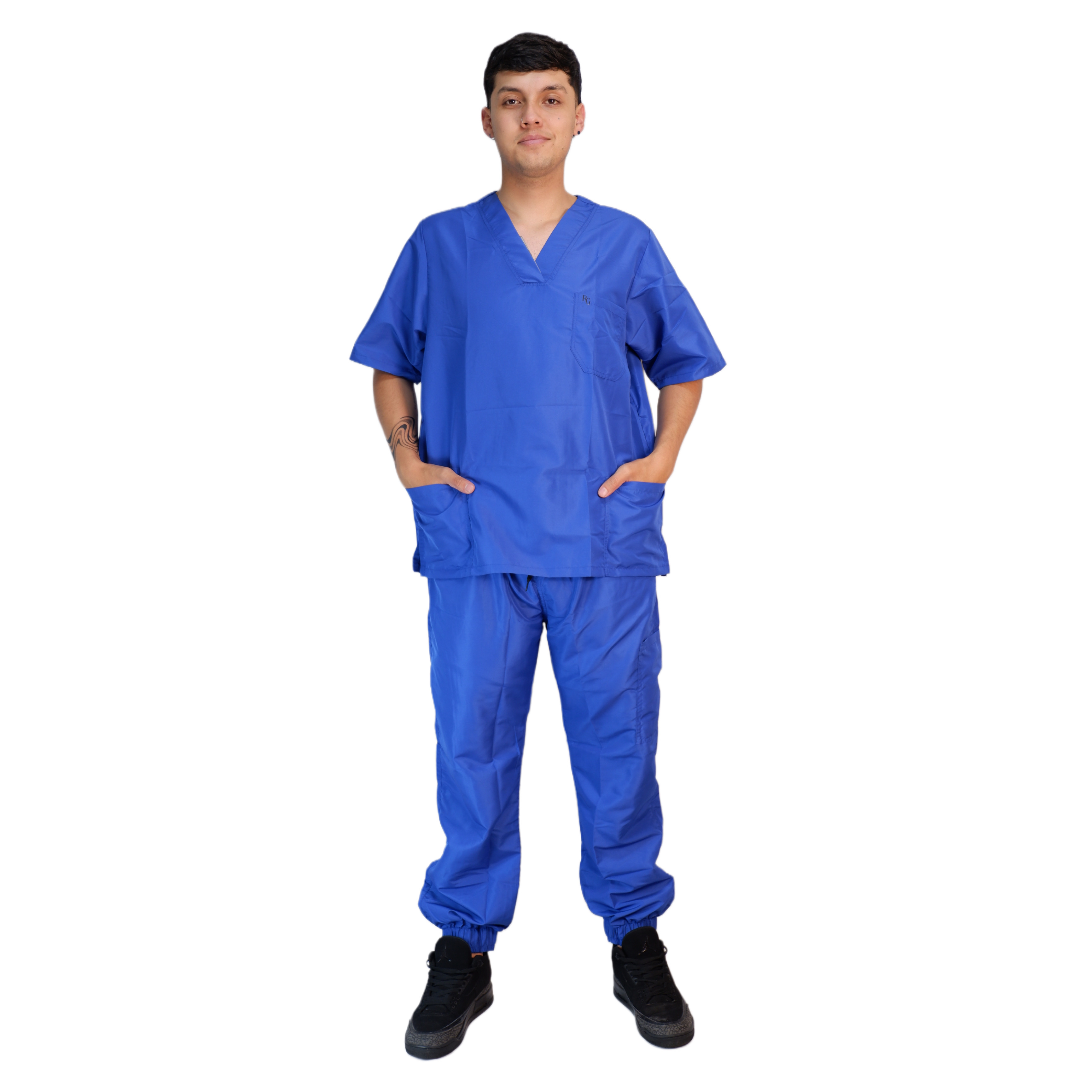 Sharom model wearing a blue medical scrub set